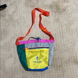 Cotopaxi cross body purse